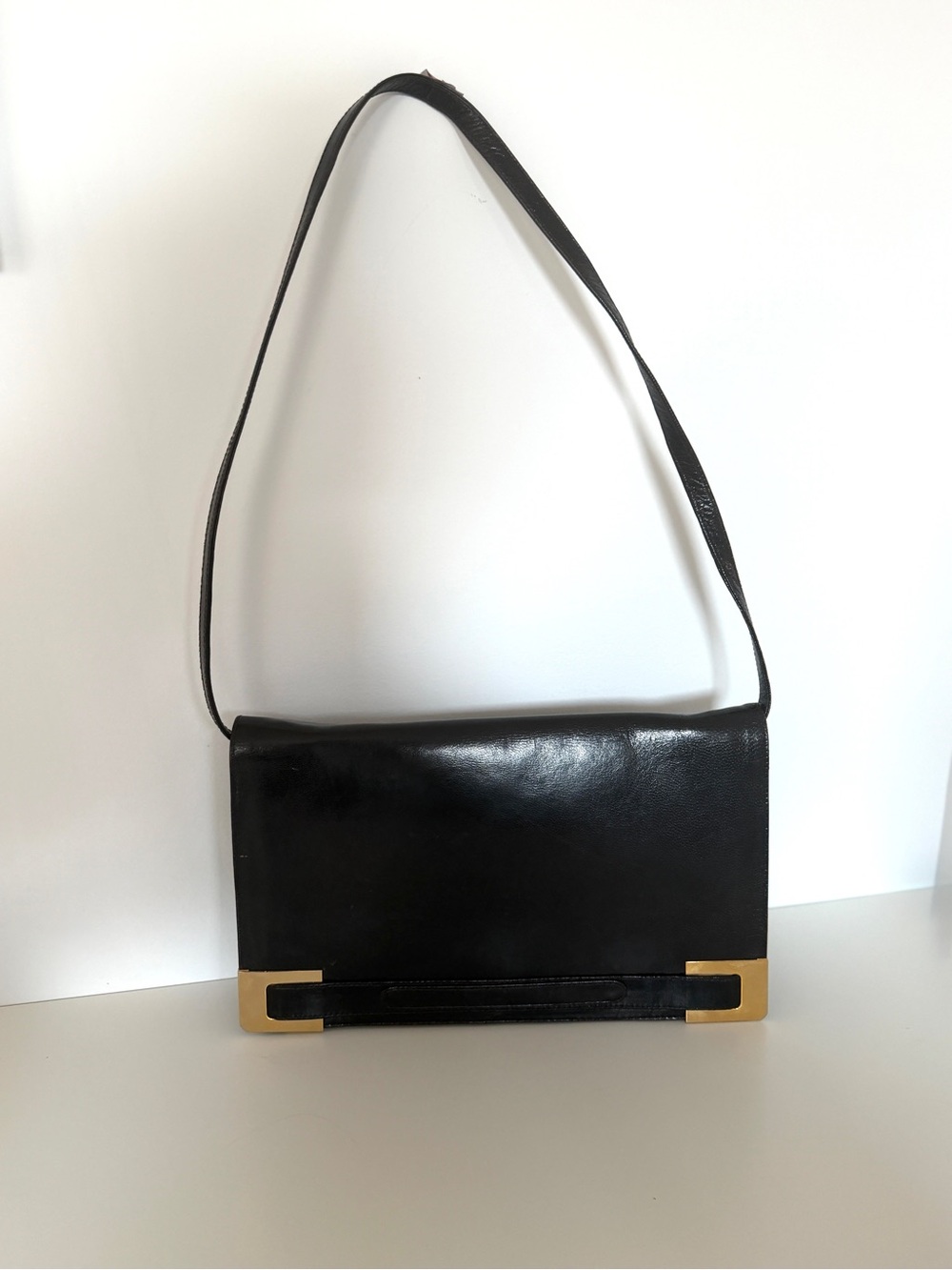 Vintage Black Leather Shoulder Bag with Gold Accents
